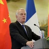 Ngoại trưởng Pháp Jean-Marc Ayrault phát biểu tại buổi họp báo ngày 14/4 trong chuyến thăm Trung Quốc. (Nguồn: AFP)