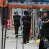 Cảnh sát Philippines điều tra tại hiện trường vụ nổ. (Nguồn: THX/TTXVN)