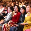 Bà Ngô Thị Thanh Hằng (áo đỏ) tại phiên khai mạc Hội nghị Thượng đỉnh Phụ nữ toàn cầu lần thứ 27 tại Tokyo. (Ảnh: Quang Hải/TTXVN)