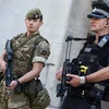 Cảnh sát và quân đội Anh tăng cường an ninh tại London ngày 25/5. (Nguồn: AFP/TTXVN)