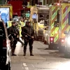 Cảnh sát phong tỏa hiện trường vụ xe tải lao vào người đi bộ trên Cầu London tối 3/6. (Nguồn: AFP/TTXVN)