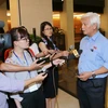 Đại biểu Quốc hội tỉnh Đồng Nai Dương Trung Quốc trả lời phỏng vấn báo chí. (Ảnh: Doãn Tấn/TTXVN)
