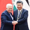 Chủ tịch Trung Quốc Tập Cận Bình và Tổng thống Palestine Mahmoud Abbas (trái) tại cuộc gặp ở Bắc Kinh. (Nguồn: THX/TTXVN)