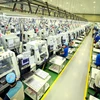 Dây chuyền sản xuất linh kiện điện tử tại Công ty trách nhiệm hữu hạn Bokwang Vina (Khu công nghiệp Điềm Thụy). (Ảnh: Hoàng Hùng/TTXVN)
