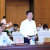 Bộ trưởng Bộ Tư pháp Lê Thành Long phát biểu tại buổi họp Ủy ban Thường vụ Quốc hội cho ý kiến về dự án Luật sửa đổi, bổ sung một số điều của Luật Lý lịch tư pháp. (Ảnh: Trọng Đức/TTXVN)
