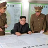 Triều Tiên cho thấy thoáng qua kế hoạch bắn các tên lửa nhằm vào khu vực gần đảo Guam trong các bức ảnh được truyền thông nhà nước công bố vào ngày 15/8. (Nguồn: Reuters)