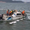 Ứng phó với sự cố tràn dầu trên biển Thanh Hóa do vụ chìm tàu ở khu vực biển giáp ranh Thanh Hóa-Nghệ An, ngày 6/8. (Ảnh: Khiếu Tư/TTXVN)