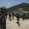 Binh sỹ và xe quân sự Hàn Quốc tham gia một cuộc tập trận ở Cherwon, phía bắc Seoul ngày 19/7. (Nguồn: Yonhap/TTXVN)