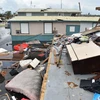 Cảnh hư hại sau bão Maria ở Catano, Puerto Rico ngày 21/9. (Nguồn: AFP/TTXVN)