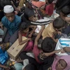 Người tị nạn Hồi giáo Rohingya trên đường tới lánh nạn tại trại tị nạn Nayapara, Bangladesh ngày 3/10. (Nguồn: AFP/TTXVN)