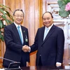 Thủ tướng Nguyễn Xuân Phúc và ông Kuniharu Nakamura, Chủ tịch Ủy ban Kinh tế Nhật-Việt của Keidanren. (Ảnh: Thống Nhất/TTXVN)