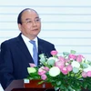Thủ tướng Nguyễn Xuân Phúc phát biểu chỉ đạo tại Diễn đàn phát triển thị trường cho ngành rau, củ, quả và giải pháp phát triển hệ thống Logistics phục vụ nông nghiệp-nông thôn. (Ảnh: Thống Nhất/TTXVN)