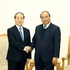 Thủ tướng Nguyễn Xuân Phúc tiếp ông Choi Young Joo, Chủ tịch Công ty Panko, Hàn Quốc, Chủ tịch Hội hữu nghị Hàn Quốc-Việt Nam. (Ảnh: Thống Nhất/TTXVN)