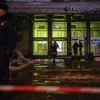 Cảnh sát chữa cháy làm nhiệm vụ tại hiện trường vụ nổ ở St. Petersburg, Nga ngày 27/12. (Nguồn: AFP/TTXVN)