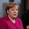 Thủ tướng Đức Angela Merkel trả lời báo giới trước cuộc đàm phán thành lập Chính phủ liên minh tại Berlin ngày 7/1/2018. (Nguồn: THX/TTXVN)