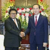 Chủ tịch nước Trần Đại Quang tiếp Chủ tịch Hội đồng đại biểu địa phương (Thượng viện) Indonesia Oesman Sapta Odang. (Ảnh: Nhan Sáng/TTXVN)