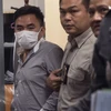 Boonchai Bạch (trái) tại thời điểm bị bắt giữ. (Nguồn: AFP)