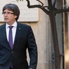 Ông Carles Puigdemont khi còn giữ chức Thủ hiến Catalonia tới dự một cuộc họp ở Barcelona ngày 17/10/2017. (Nguồn: AFP/TTXVN)