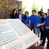 Đoàn Thanh niên TTXVN thăm Khu Di tích Việt Nam Thông tấn xã tại thôn Trung Yên, huyện Sơn Dương, tỉnh Tuyên Quang. (Ảnh: Minh Quyết/TTXVN)