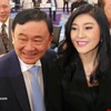 Cựu Thủ tướng Thaksin Shinawatra và người em gái Yingluck Shinawatra xuất hiện ở Tokyo trong một sự kiện giới thiệu sách. (Nguồn: asahi.com)