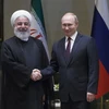 Tổng thống Nga Vladimir Putin gặp Tổng thống Iran Rouhani bên lề Hội nghị thượng đỉnh ba bên Thổ Nhĩ Kỳ-Nga-Iran về Syria ở Ankara, Thổ Nhĩ Kỳ. (Nguồn: AFP/TTXVN)