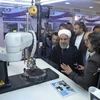 Tổng thống Hassan Rouhani cùng một loạt quan chức cấp cao của Iran tham dự Ngày Công nghệ Hạt nhân quốc gia. (Nguồn: AP)