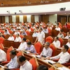 Đại biểu dự Hội nghị lần thứ bảy Ban Chấp hành Trung ương Đảng Cộng sản Việt Nam thảo luận tại hội trường. (Nguồn: TTXVN)