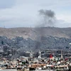 Khói bốc lên tại hiện trường một vụ tấn công bằng tên lửa ở Damascus, Syria ngày 9/5. (Nguồn: THX/TTXVN)