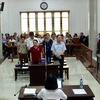 Các bị cáo tại phiên tòa. (Ảnh: Nguyễn Dũng/Vietnam+)