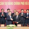 Lễ ký quy chế phối hợp công tác giữa Ban Cán sự đảng Chính phủ và Ban Kinh tế Trung ương. (Ảnh: Thống Nhất/TTXVN)