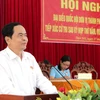 Chủ tịch Ủy ban Trung ương Mặt trận Tổ quốc Việt Nam Trần Thanh Mẫn trả lời ý kiến cử tri tại buổi tiếp xúc. (Ảnh: Thanh Liêm/TTXVN)
