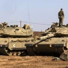 Xe tăng Israel ở khu vực biên giới Cao nguyên Golan. (Nguồn: AFP)