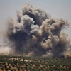 Khói bốc lên sau các cuộc không kích của lực lượng Chính phủ Syria tại Daraa ngày 26/6. (Nguồn: AFP/TTXVN)