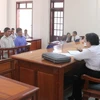 Bị cáo Phan Thế Thượng và Trần Văn Giang tại phiên tòa sơ thẩm. (Ảnh: Sỹ Tuyên/TTXVN)
