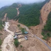 Cảnh tan hoang sau khi cơn lũ dữ quét qua bản Chu Va, xã Sơn Bình, huyện Tam Đường (Lai Châu), tháng 6/2018. (Ảnh: Quý Trung/TTXVN)