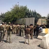 Lực lượng an ninh người Kurd tập trung gần tòa nhà chính quyền Erbil, ngày 23/7. (Nguồn: Reuters)