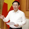 Phó Thủ tướng Vương Đình Huệ, Trưởng ban Chỉ đạo đổi mới và phát triển doanh nghiệp phát biểu. (Ảnh: Văn Điệp/TTXVN)