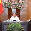 Thủ tướng Nguyễn Xuân Phúc chủ trì phiên họp Thường trực Chính phủ về tình hình nhập khẩu phế liệu vào Việt Nam và các giải pháp quản lý. (Ảnh: Thống Nhất/TTXVN)