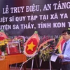 Lễ Truy điệu, an táng 21 liệt sỹ tại Nghĩa trang liệt sỹ huyện Sa Thầy vào sáng 27/7. (Ảnh: Cao Nguyên/TTXVN)