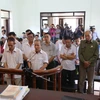 Các bị cáo tại phiên tòa sơ thẩm. (Ảnh: Nguyễn Văn Cảnh/TTXVN)
