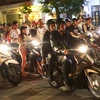 Lực lượng công an thành phố Hà Nội duy trì giữ gìn an ninh trật tự trên những tuyến phố. (Ảnh: Doãn Tấn/TTXVN)