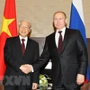 Tổng thống Liên bang Nga Vladimir Putin đón Tổng Bí thư Nguyễn Phú Trọng trong chuyến thăm năm 2014. (Ảnh: Trí Dũng/TTXVN)