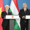 Tổng Bí thư Nguyễn Phú Trọng cùng Thủ tướng Hungary Viktor Orbán phát biểu với báo chí. (Ảnh: Trí Dũng/TTXVN)