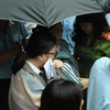 Hai nhân viên Phòng khánh hàng của ngân hàng Exinbank bị bắt để điều tra vi đã có hành vi giúp sức cho Lê Nguyễn Hưng. (Ảnh: Thành Chung/TTXVN)