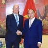 Thủ tướng Nguyễn Xuân Phúc gặp gỡ, trao đổi với giáo sư Klaus Schwab, Người sáng lập và Chủ tịch điều hành Diễn đàn Kinh tế thế giới (WEF). (Ảnh: Thống Nhất/TTXVN)