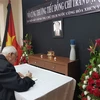 Ghi sổ tang viếng Chủ tịch nước Trần Đại Quang ở Chile. Ảnh minh họa. (Nguồn: TTXVN)