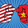 Kinh tế toàn cầu chịu rủi ro từ cuộc chiến thương mại Mỹ-Trung