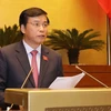 Tổng Thư ký, Chủ nhiệm Văn phòng Quốc hội Nguyễn Hạnh Phúc trình bày báo cáo trước Quốc hội. (Ảnh: Phương Hoa/TTXVN)