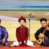 Các nghệ nhân ca trù ở Nghi Xuân, Hà Tĩnh trên chiếu hát. (Nguồn: baohatinh.vn)