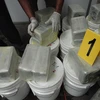 Ảnh tư liệu: Cảnh sát trưng bày số ma túy thu giữ tại San Salvador, El Salvador ngày 18/7/2013. Ảnh minh họa. (Nguồn: AFP/TTXVN)